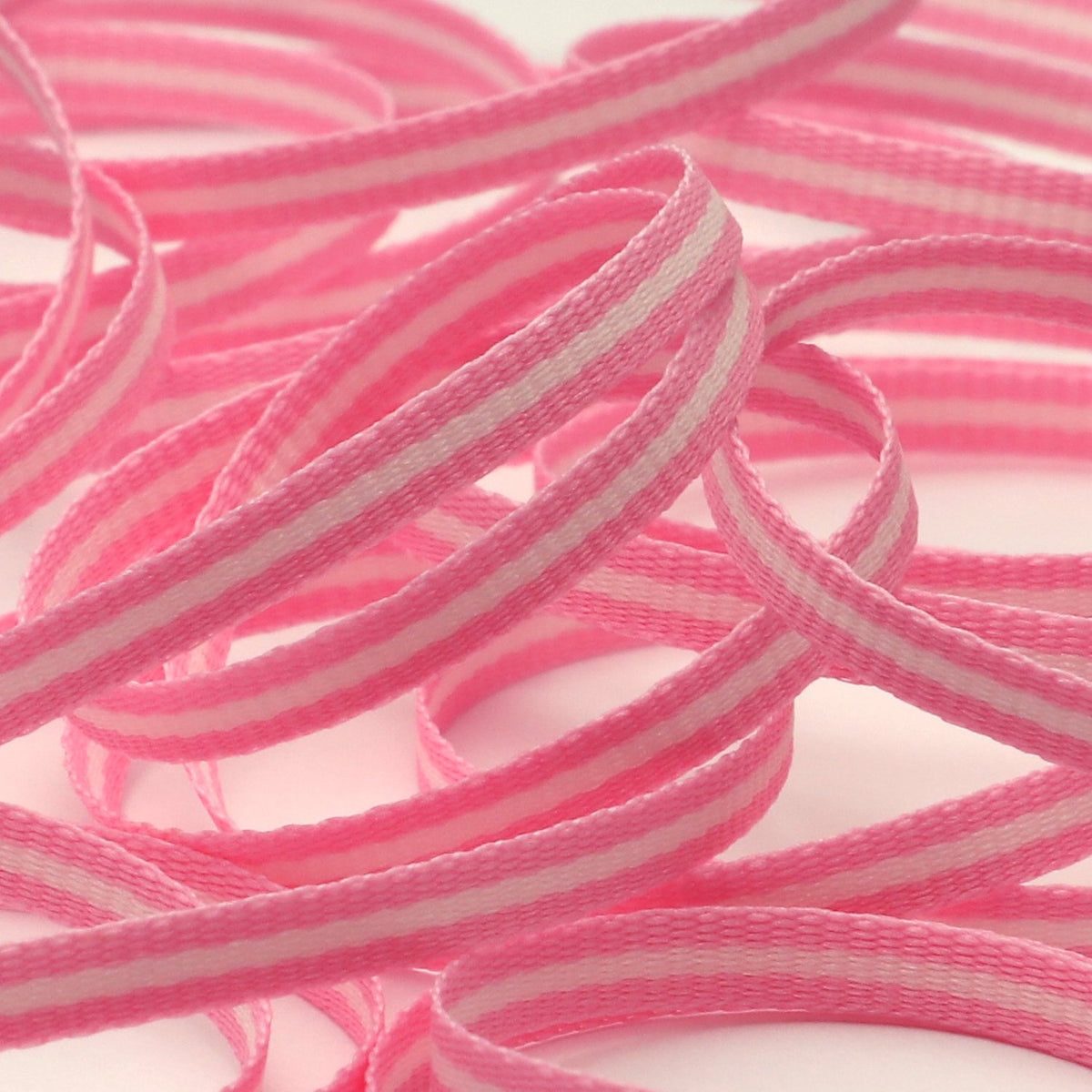 Swirls in hot pink on light pink 1.5 ribbon